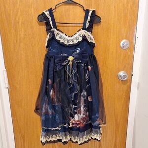 Deep blue lolita dress with gold accents and lace